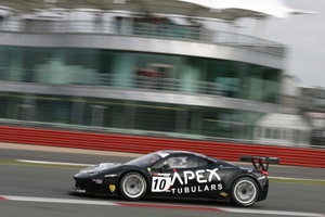 Glynn Geddie racing past the BRDC Clubhouse at Silverstone