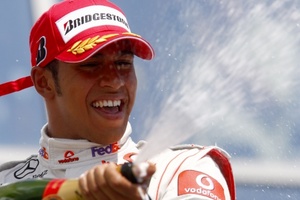 Lewis Hamilton celebrates his 2009 Hungarian Grand Prix victory