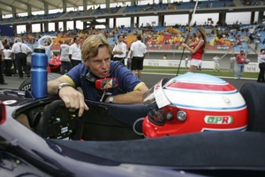 David giving last minute instructions to Adam Carroll GP2 race in 2005